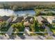 Beautiful home with a pond view, mature trees, and landscaping at 11720 Winterset Cove Dr, Riverview, FL 33579