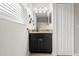 Bathroom featuring a dark cabinet vanity and marble countertops at 11720 Winterset Cove Dr, Riverview, FL 33579