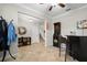 A cozy living room features tile floors and a dart board at 11720 Winterset Cove Dr, Riverview, FL 33579