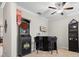 The recreational room features a bar, dart board, and ceiling fan at 11720 Winterset Cove Dr, Riverview, FL 33579