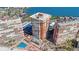 Stunning aerial view of a beachfront condo featuring a pool and beautiful bay views at 17920 Gulf Blvd # 1103, Redington Shores, FL 33708