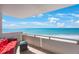 Balcony provides a stunning ocean view, complemented by comfortable seating, for relaxation and entertainment at 17920 Gulf Blvd # 1103, Redington Shores, FL 33708