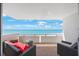 Relaxing balcony featuring comfortable seating with stunning ocean views at 17920 Gulf Blvd # 1103, Redington Shores, FL 33708