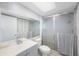 Bathroom featuring shower, vanity, and tile floors at 17920 Gulf Blvd # 1103, Redington Shores, FL 33708