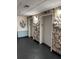 Condo elevators featuring stone accent walls and unique light fixtures at 17920 Gulf Blvd # 1103, Redington Shores, FL 33708