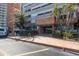 Inviting entrance to building with beautiful landscaping and brick paved drive at 17920 Gulf Blvd # 1103, Redington Shores, FL 33708