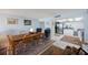 Open-concept living and dining area leads to a bright, modern kitchen with stainless appliances at 17920 Gulf Blvd # 1103, Redington Shores, FL 33708