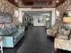 Inviting condo lobby with comfortable seating and stylish decor on sleek tile flooring at 17920 Gulf Blvd # 1103, Redington Shores, FL 33708