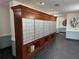 Hallway features a wooden structure that contains many mailboxes for residents at 17920 Gulf Blvd # 1103, Redington Shores, FL 33708