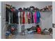 Walk-in closet with wire shelving full of clothes, boxes, and shoes at 2375 Harris Hawk Ave, Ruskin, FL 33570