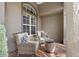 Inviting front porch featuring comfortable seating and stylish decor for relaxing outdoors at 2981 Northfield Dr, Tarpon Springs, FL 34688