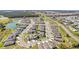 New homes nestled in a well-planned community surrounded by a picturesque lake and lush green spaces at 3224 Fresno Pl, Zephyrhills, FL 33541