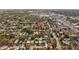 Aerial view highlighting a home's location, marked by a red pin, within a neighborhood featuring a community pool at 3235 34Th N Ave, St Petersburg, FL 33713