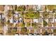 Overhead view displays a brown roof and solar panels, set in an urban layout with green trees and various buildings at 3235 34Th N Ave, St Petersburg, FL 33713