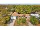 Aerial view of the charming single-Gathering home with a well-manicured lawn and mature trees at 3235 34Th N Ave, St Petersburg, FL 33713