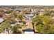 Aerial view of the home, featuring mature trees and landscape at 3235 34Th N Ave, St Petersburg, FL 33713