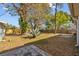 Expansive backyard with mature trees and a patio area at 3235 34Th N Ave, St Petersburg, FL 33713
