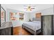 Bedroom with wood floors, ceiling fan, and natural light creates a warm ambiance at 3235 34Th N Ave, St Petersburg, FL 33713