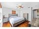 Bedroom with wood floors, ceiling fan, and natural light creates a cozy atmosphere at 3235 34Th N Ave, St Petersburg, FL 33713