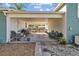 Covered carport featuring a patio with potted plants and seating at 3235 34Th N Ave, St Petersburg, FL 33713