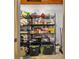Pantry with shelves stocked with food and household items for easy organization at 3235 34Th N Ave, St Petersburg, FL 33713