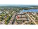 Overhead view showing townhome community with lush landscaping and waterfront views at 3870 Island Way, St Petersburg, FL 33705