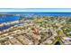 An aerial shot showcasing the condo community with a pool and access to nearby golfing and beautiful waterfront views at 3870 Island Way, St Petersburg, FL 33705
