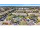 Aerial view featuring townhomes, a community pool, and convenient parking at 3870 Island Way, St Petersburg, FL 33705
