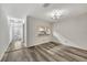 Bright dining area with wood-look floors and kitchen pass-through at 3870 Island Way, St Petersburg, FL 33705