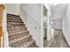 Unique staircase features decorative tile steps and leads to the upper level at 3870 Island Way, St Petersburg, FL 33705