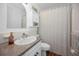 Bathroom featuring a granite-style countertop and vanity with a shower tub at 4191 39Th S St, St Petersburg, FL 33711