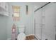 Bathroom featuring a glass-enclosed shower and decorative accents at 4191 39Th S St, St Petersburg, FL 33711