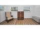 Cozy bedroom features lots of natural light and wood-look floors at 4191 39Th S St, St Petersburg, FL 33711
