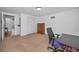 Bedroom with carpet flooring and a desk at 4191 39Th S St, St Petersburg, FL 33711