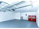 Spacious garage with laundry hookups and ample storage space, ready for personalization at 4222 Autumn Leaves Dr, Tampa, FL 33624