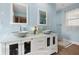 Stylish bathroom with double sink vanity, modern mirrors, and a bright, airy feel at 4407 Parnell Dr, Sarasota, FL 34232