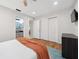 Inviting bedroom with a cozy bed, full closet and an ensuite bath at 4407 Parnell Dr, Sarasota, FL 34232
