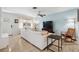 Bright, airy living room with a large window, comfortable seating, and contemporary decor at 4407 Parnell Dr, Sarasota, FL 34232