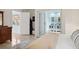 Bright primary bedroom with a full closet and an ensuite bath featuring double vanities at 4407 Parnell Dr, Sarasota, FL 34232