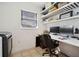 Functional home office space featuring a desk, shelves, and storage, ideal for remote work or study at 4407 Parnell Dr, Sarasota, FL 34232
