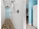 Elegant walk-in shower featuring pebble flooring and sleek, white subway tile walls at 4407 Parnell Dr, Sarasota, FL 34232