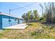 Spacious backyard with a wooden fence and concrete patio at 5600 Bay Ne St, St Petersburg, FL 33703