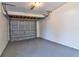 Clean and bright garage with fresh paint, ample storage, and overhead door at 5600 Bay Ne St, St Petersburg, FL 33703