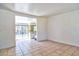 The living room has neutral flooring, white walls, and an opening to kitchen at 5600 Bay Ne St, St Petersburg, FL 33703