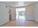 Open living space with tile flooring and access to the kitchen and patio at 5600 Bay Ne St, St Petersburg, FL 33703