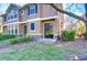 Charming exterior view of a home with a sliding glass door and landscaped backyard at 5704 Kingletsound Pl, Lithia, FL 33547