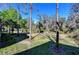 Large backyard with a mix of sunny and shady areas and mature trees at 5704 Kingletsound Pl, Lithia, FL 33547