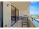 Relax on the balcony with water views and tile flooring at 6009 Sea Ranch Dr # 307, Hudson, FL 34667