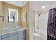 Modern bathroom with a new vanity, illuminated mirror, and updated shower at 6009 Sea Ranch Dr # 307, Hudson, FL 34667