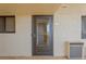 Condo exterior featuring unit 307's door, window, and a/c unit at 6009 Sea Ranch Dr # 307, Hudson, FL 34667